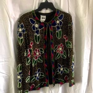 Evening 100% Silk jacket with beats says Xl but actually can fit large to medium